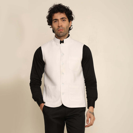 White Pashmina Nehru Jacket for Men which has classic 3-pocket design. Perfect mens white formal nehru jacket for male by Crease India.