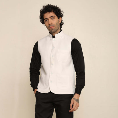 White Pashmina Nehru Jacket for Men which has classic 3-pocket design. Perfect mens white formal nehru jacket for male by Crease India.