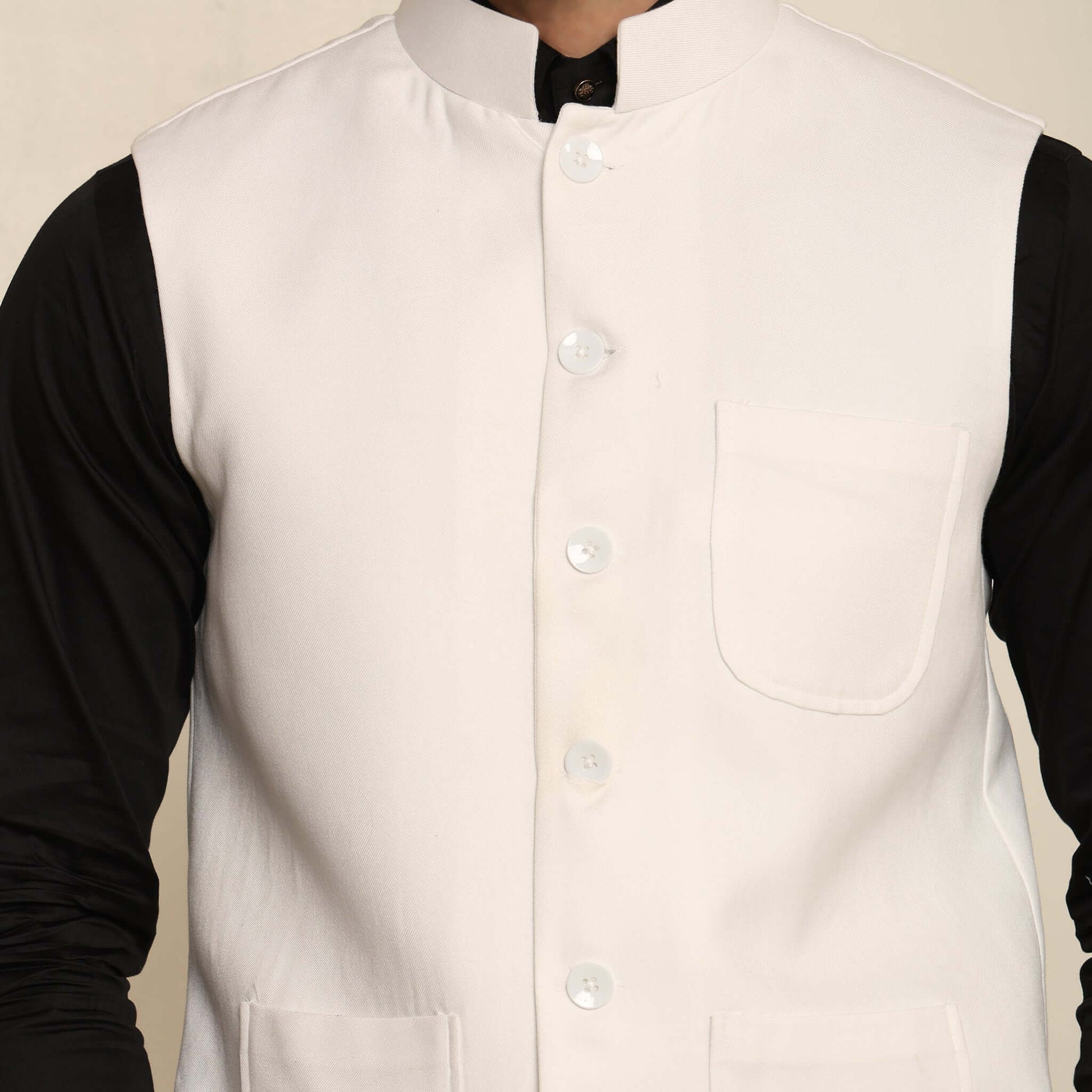 White Pashmina Nehru Jacket for Men which has classic 3-pocket design. Perfect mens white formal nehru jacket for male by Crease India.