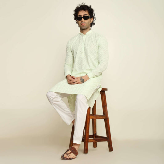 NAQSH Mint Green Chikankari Kurta for Men which has chikankari embroidery. Perfect mens mint green wedding kurta for male by Crease India.