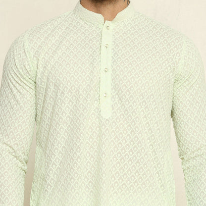 NAQSH Mint Green Chikankari Kurta for Men which has chikankari embroidery. Perfect mens mint green wedding kurta for male by Crease India.