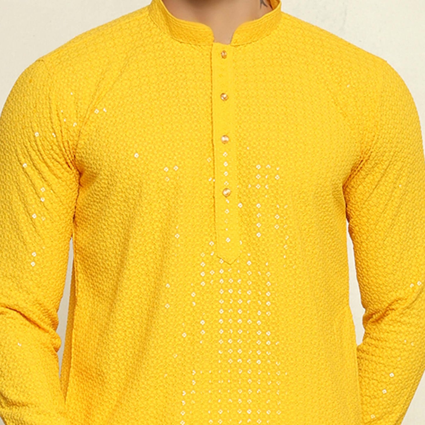 NAQSH Yellow Sequin Embellished Chikankari Kurta for Men which has chikankari and sequins embellishments. Perfect mens haldi wedding kurta for male by Crease India.