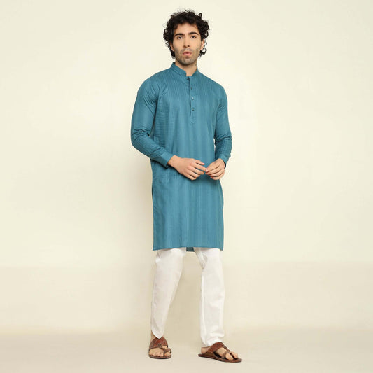 NAQSH Blue Jacquard Cotton Kurta Set for Men which has jacquard design. Perfect mens blue wedding kurta for male by Crease India.