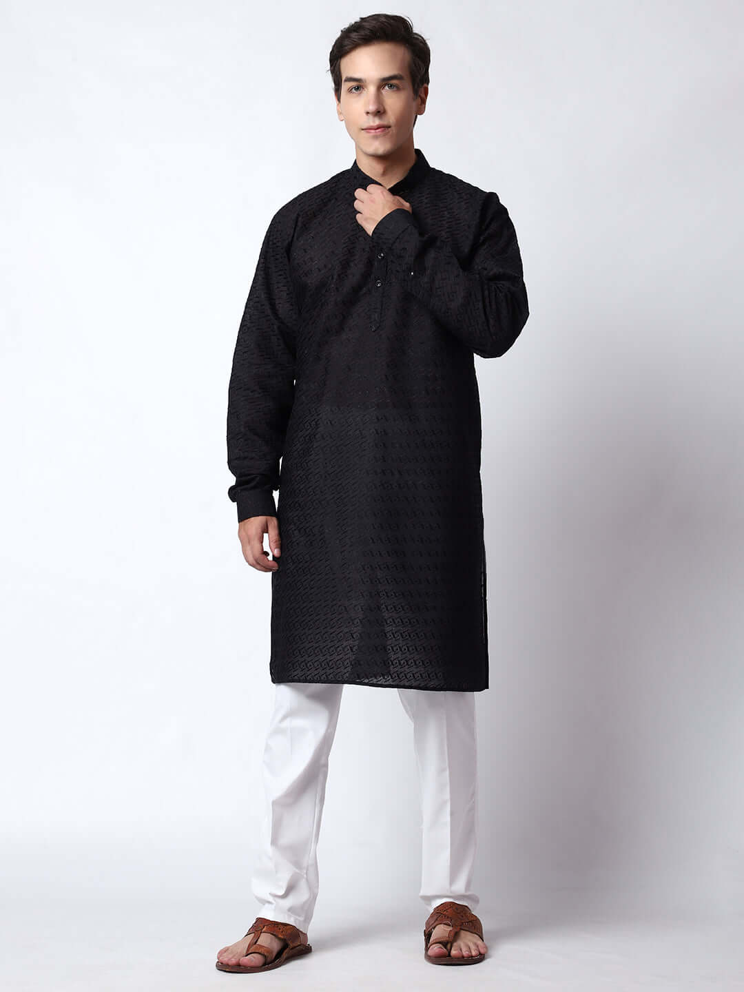 Black Chikankari Kurta for Men, perfect for Indian wedding functions, festivals, casual outings, office ethnic day wear, and other occasions. Shop this chikankari kurta for male on Crease India Website.