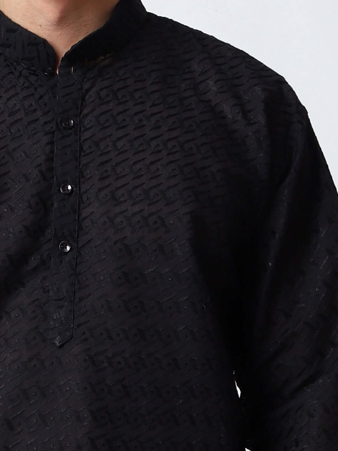 Black Chikankari Kurta for Men, perfect for Indian wedding functions, festivals, casual outings, office ethnic day wear, and other occasions. Shop this chikankari kurta for male on Crease India Website.