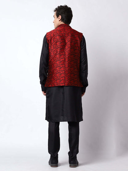 Red & Black kurta jacket set for men available online in India. An elegant men's ethnic wear kurta jacket set with intricate black floral embroidery design on red jacquard jacket. The red jacquard jacket boasts a mandarin collar and complements the black kurta and pants, crafted from smooth cotton silk. This designer red jacquard kurta jacket set for men is ideal for weddings, Diwali, Eid, Navratri, & more festivals. Shop this designer red & black kurta set for men at Crease India Website.