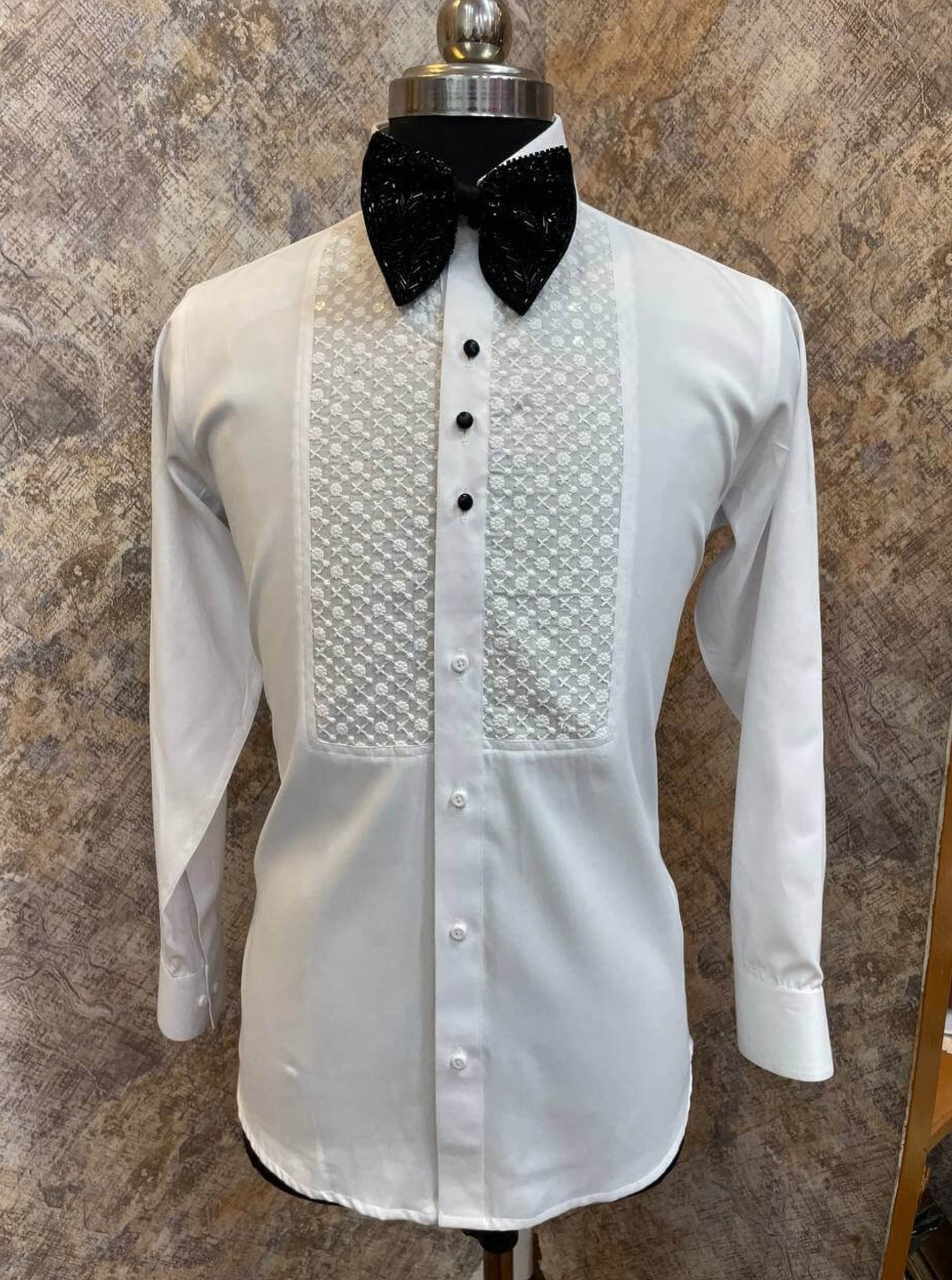 Chikankari Tuxedo Shirt for Men, perfect for weddings. galas, prom nights, black tie events, and other formal events. Shop this designer white tuxedo shirt for men on Crease India Website.