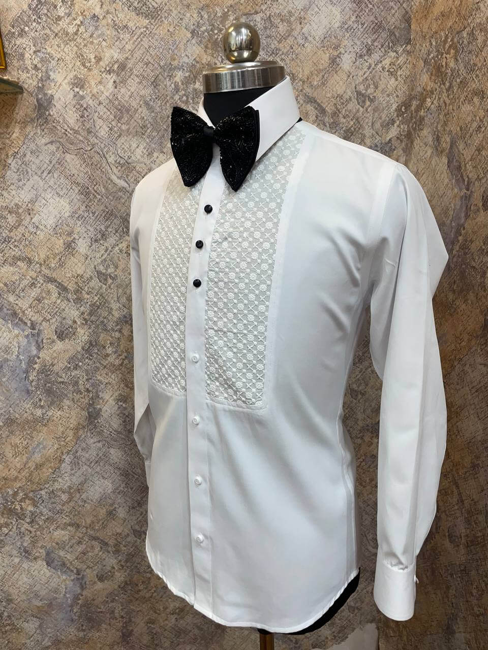 Chikankari Tuxedo Shirt for Men, perfect for weddings. galas, prom nights, black tie events, and other formal events. Shop this designer white tuxedo shirt for men on Crease India Website.