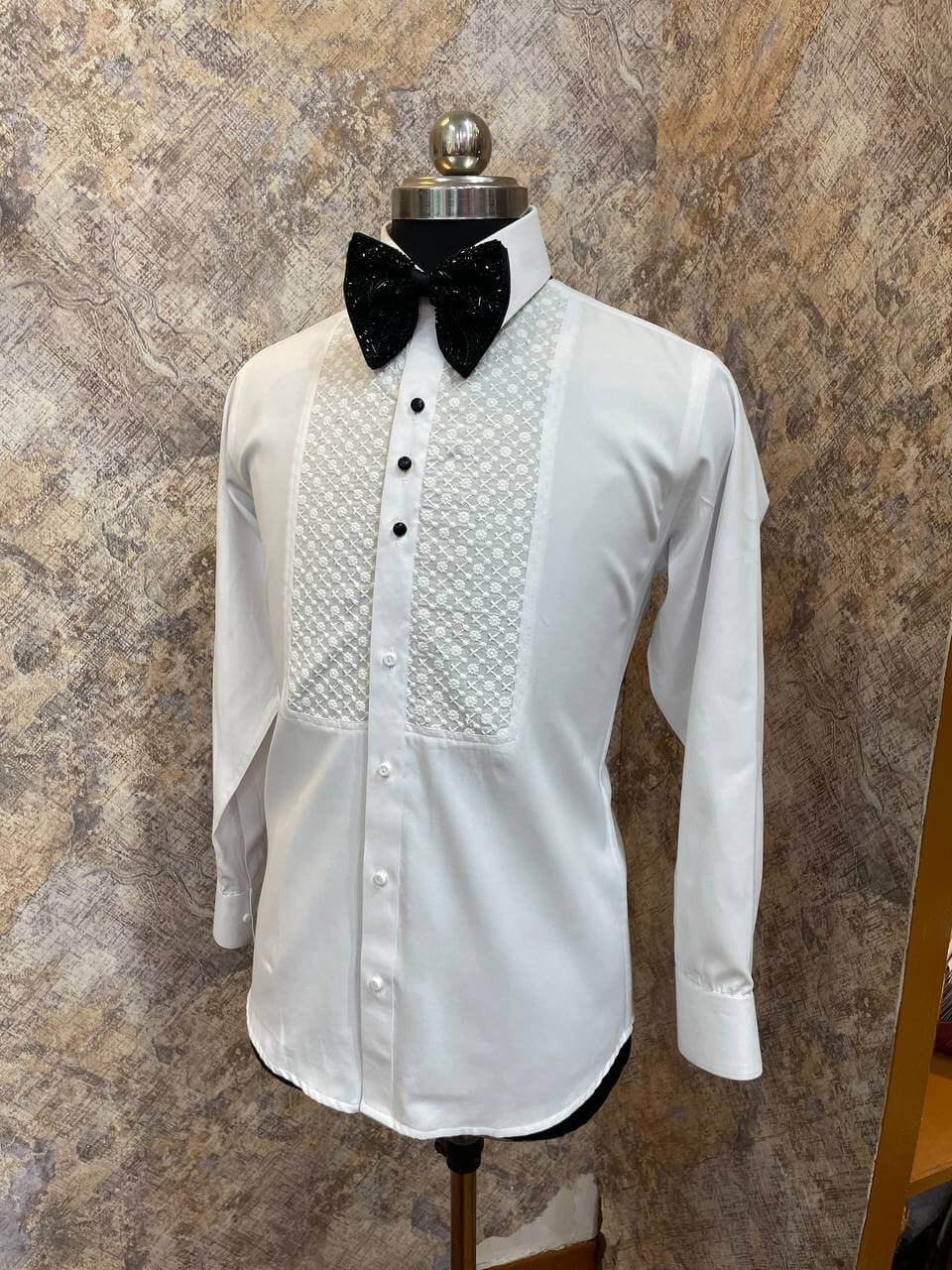 Chikankari Tuxedo Shirt for Men, perfect for weddings. galas, prom nights, black tie events, and other formal events. Shop this designer white tuxedo shirt for men on Crease India Website.