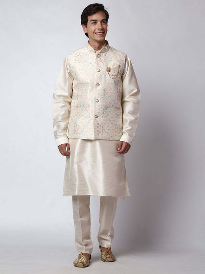 Cream Dupion Silk Kurta Pant Jacket Set for Men. This designer kurta set for men features a luxurious dupion silk jacket adorned with intricate and vibrant multicolored thread embroidery. The matching cream dupion silk kurta and pants complement the embroidered jacket beautifully. This men's kurta set is ideal for weddings, Diwali, Eid, Navratri, & special occasions. Buy this designer kurta jacket set for men at Crease India website.