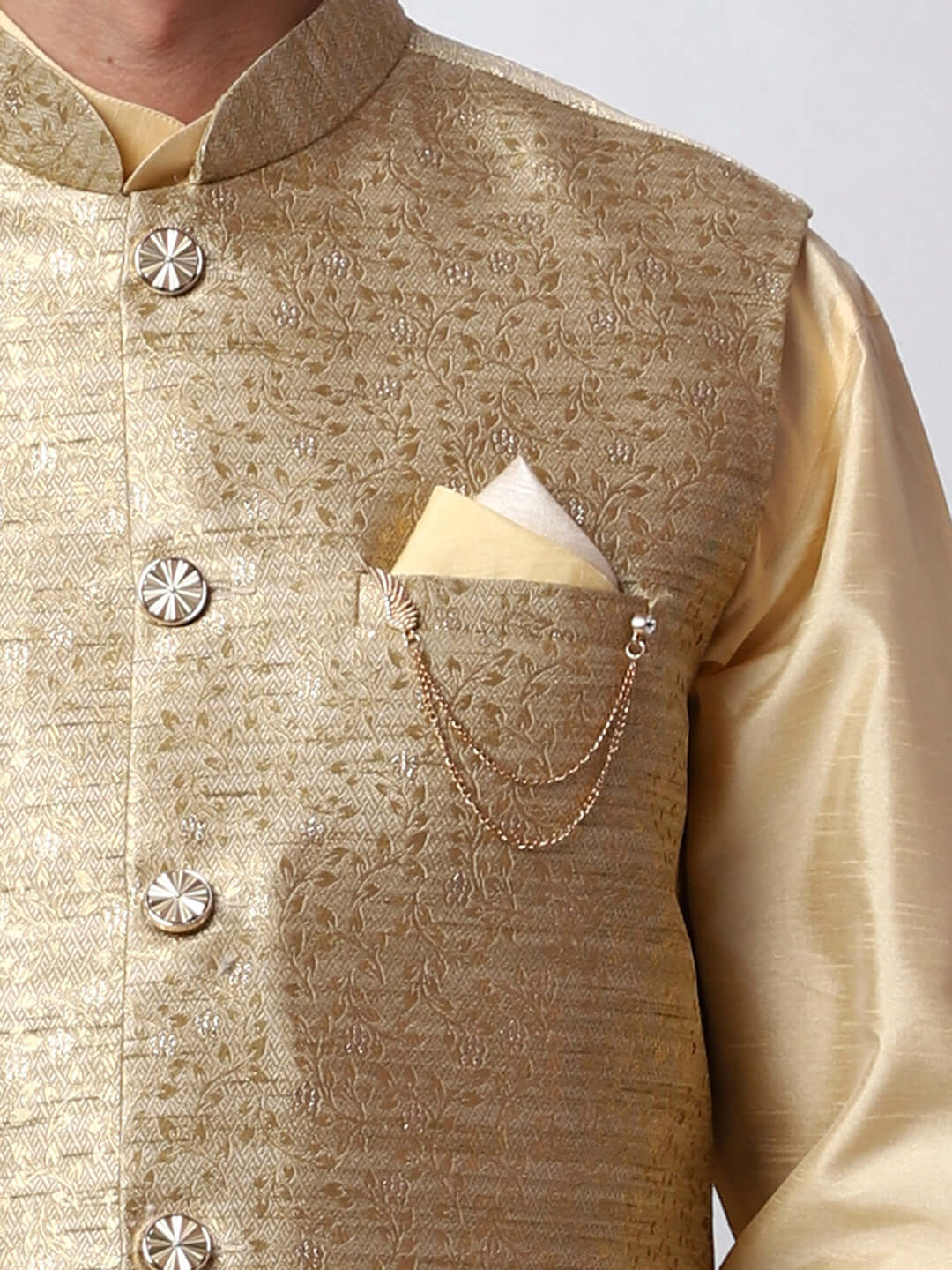 Dark Fawn kurta jacket set for men available online in India. An elegant men's ethnic wear kurta jacket set with intricate golden petal embroidery. The sophisticated dark fawn jacket boasts a mandarin collar and complements the same hue kurta and pants, crafted from smooth dupion silk. This designer kurta jacket set for men is ideal for weddings, Diwali, Eid, Navratri, & more festivals. Shop this designer kurta set for men on Crease India Website.