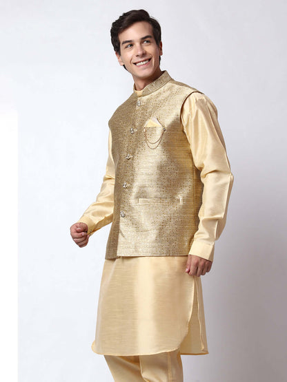 Dark Fawn kurta jacket set for men available online in India. An elegant men's ethnic wear kurta jacket set with intricate golden petal embroidery. The sophisticated dark fawn jacket boasts a mandarin collar and complements the same hue kurta and pants, crafted from smooth dupion silk. This designer kurta jacket set for men is ideal for weddings, Diwali, Eid, Navratri, & more festivals. Shop this designer kurta set for men on Crease India Website.