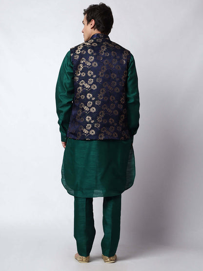 Dark Green kurta jacket set for men available online in India. An elegant men's ethnic wear kurta jacket set with intricate golden floral embroidery. The sophisticated midnight blue jacket boasts a mandarin collar and complements the dark green kurta and pants, crafted from smooth dupion silk. This designer kurta jacket set for men is ideal for weddings, Diwali, Eid, Navratri, & more festivals. Shop this designer kurta set for men on Crease India Website.