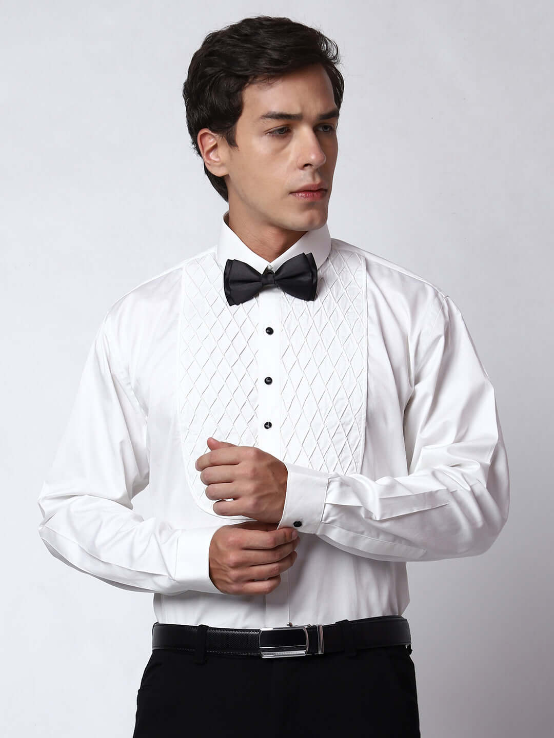 White Pleated Tuxedo Shirt for Men, perfect for weddings. galas, prom nights, black tie events, and other formal events. Shop this designer white tuxedo shirt for men on Crease India Website.