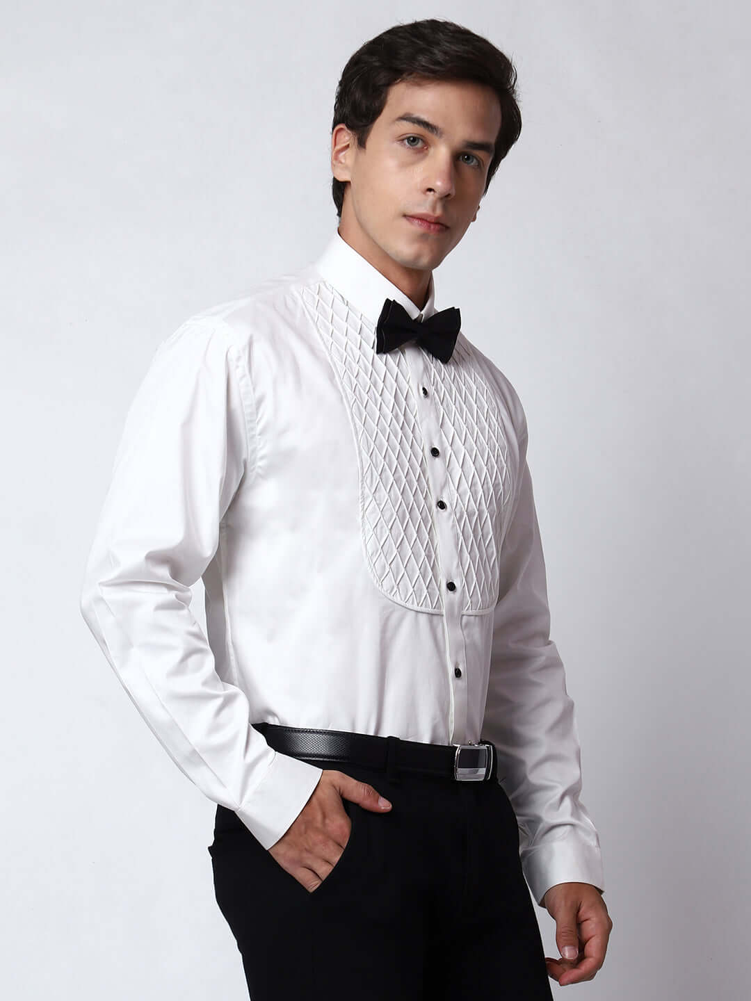 White Pleated Tuxedo Shirt for Men, perfect for weddings. galas, prom nights, black tie events, and other formal events. Shop this designer white tuxedo shirt for men on Crease India Website.