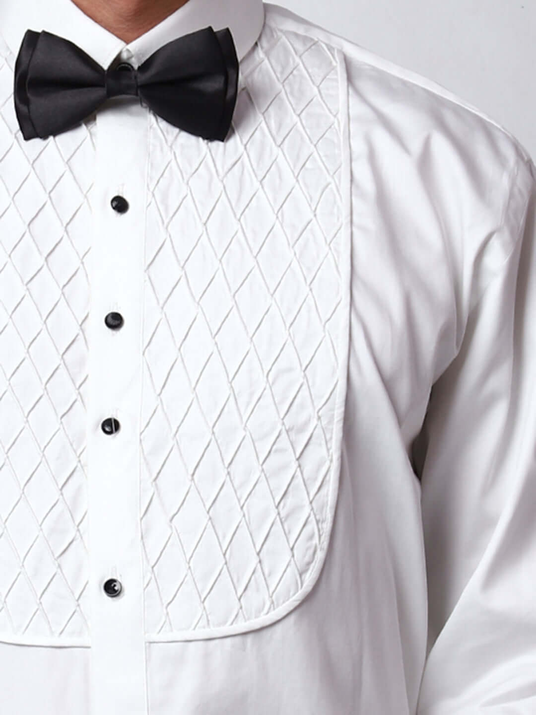 White Pleated Tuxedo Shirt for Men, perfect for weddings. galas, prom nights, black tie events, and other formal events. Shop this designer white tuxedo shirt for men on Crease India Website.