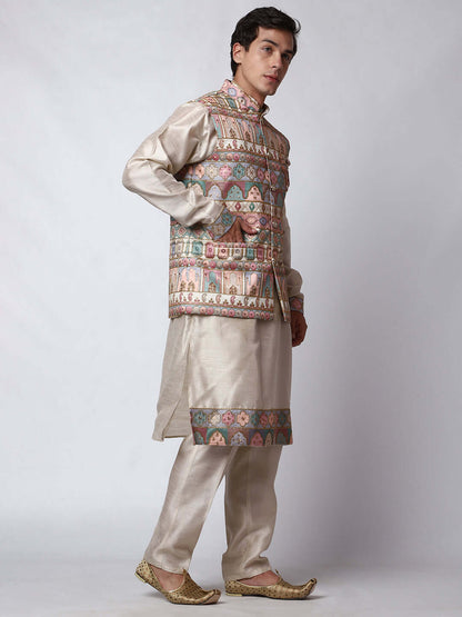 Zari Fawn Kurta Pant with Jacket for men available online in India. A sophisticated men's ethnic wear ensemble featuring a fawn dupion silk kurta jacket set. The jacket & kurta has prints and net zari embroidery detailing. This designer kurta jacket set for men is ideal for weddings, Diwali, Eid, Navratri, & more festivals. Shop this designer kurta set for men on Crease India Website.