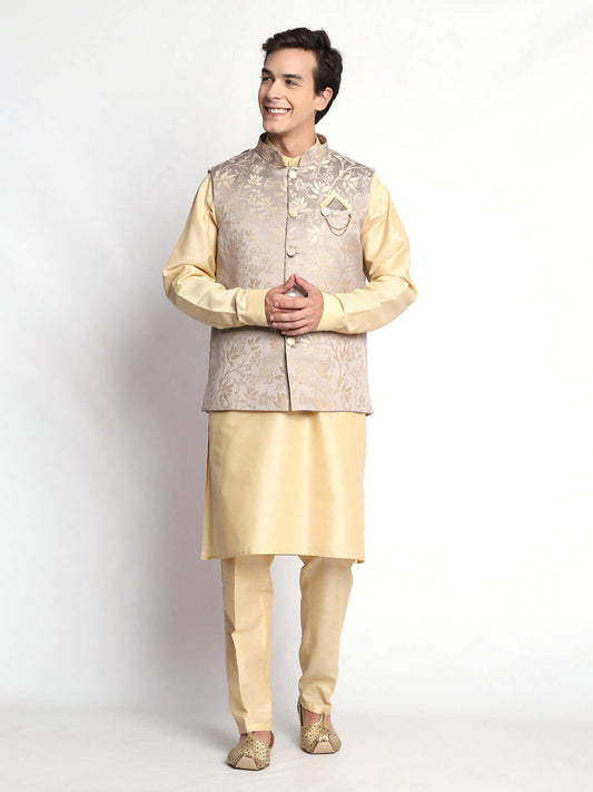 Fawn kurta jacket set for men available online in India. An elegant men's ethnic wear kurta jacket set with intricate fawn floral embroidery design on grey satin jacquard jacket. The grey satin jacquard jacket boasts a mandarin collar and complements the fawn kurta and pants, crafted from smooth cotton silk. This designer fawn satin jacquard kurta jacket set for men is ideal for weddings, Diwali, Eid, Navratri, & more festivals. Shop this designer fawn kurta set for men at Crease India Website