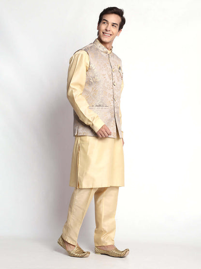 Fawn kurta jacket set for men available online in India. An elegant men's ethnic wear kurta jacket set with intricate fawn floral embroidery design on grey satin jacquard jacket. The grey satin jacquard jacket boasts a mandarin collar and complements the fawn kurta and pants, crafted from smooth cotton silk. This designer fawn satin jacquard kurta jacket set for men is ideal for weddings, Diwali, Eid, Navratri, & more festivals. Shop this designer fawn kurta set for men at Crease India Website