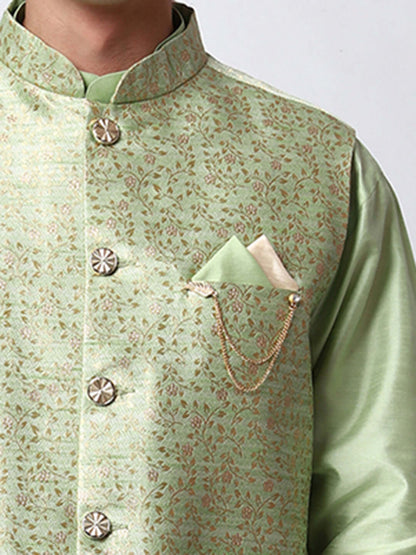 Lush Green kurta jacket set for men available online in India. An elegant men's ethnic wear kurta jacket set with intricate golden petal embroidery. The embroidered jacket boasts a mandarin collar and complements the same hue kurta and pants, crafted from smooth dupion silk. This lush green designer kurta jacket set for men is ideal for weddings, Diwali, Eid, Navratri, & more festivals. Shop this lush green designer kurta set for men on Crease India Website.