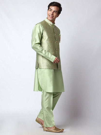 Lush Green kurta jacket set for men available online in India. An elegant men's ethnic wear kurta jacket set with intricate golden petal embroidery. The embroidered jacket boasts a mandarin collar and complements the same hue kurta and pants, crafted from smooth dupion silk. This lush green designer kurta jacket set for men is ideal for weddings, Diwali, Eid, Navratri, & more festivals. Shop this lush green designer kurta set for men on Crease India Website.