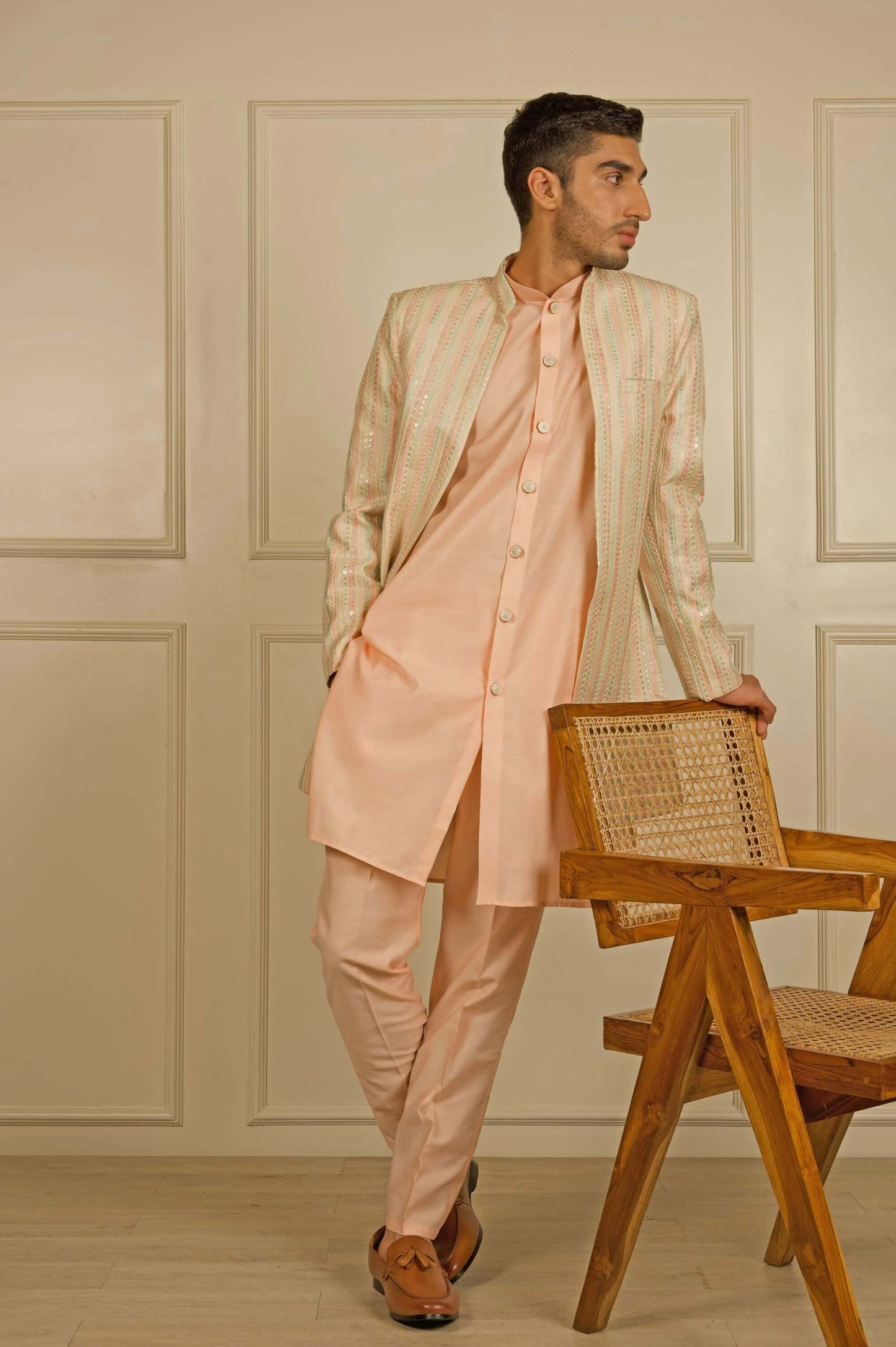 Peach Indo Western dress for men which is made up mulberry silk and have heavy embroidery on it. Shop this mens indo western dress for male from Crease India website.