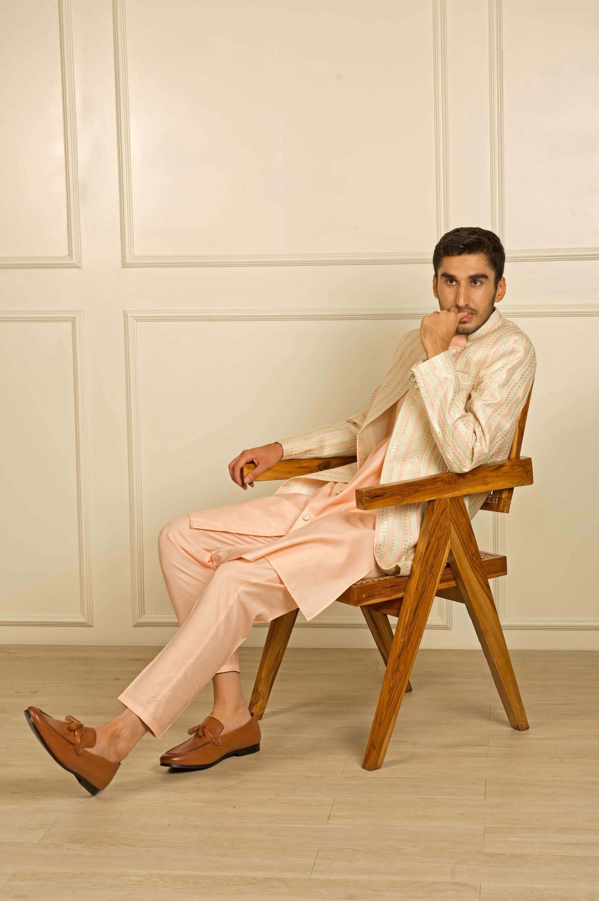 Peach Indo Western dress for men which is made up mulberry silk and have heavy embroidery on it. Shop this mens indo western dress for male from Crease India website.