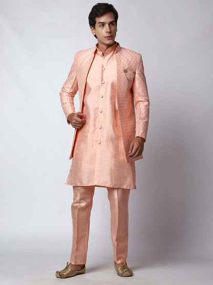 Peach Indo Western Dress for men which is made up of dupion silk with heavy embroidery, perfect for Indian weddings. Shop this mens indo western dress from Crease India website.