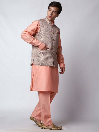 Peach kurta jacket set for men available online in India. An elegant men's ethnic wear kurta jacket set with intricate peach floral embroidery design on grey satin jacquard jacket. The grey satin jacquard jacket boasts a mandarin collar and complements the peach kurta and pants, crafted from smooth cotton silk. This designer peach satin jacquard kurta jacket set for men is ideal for weddings, Diwali, Eid, Navratri, & more festivals. Shop this designer peach kurta set for men at Crease India Website.