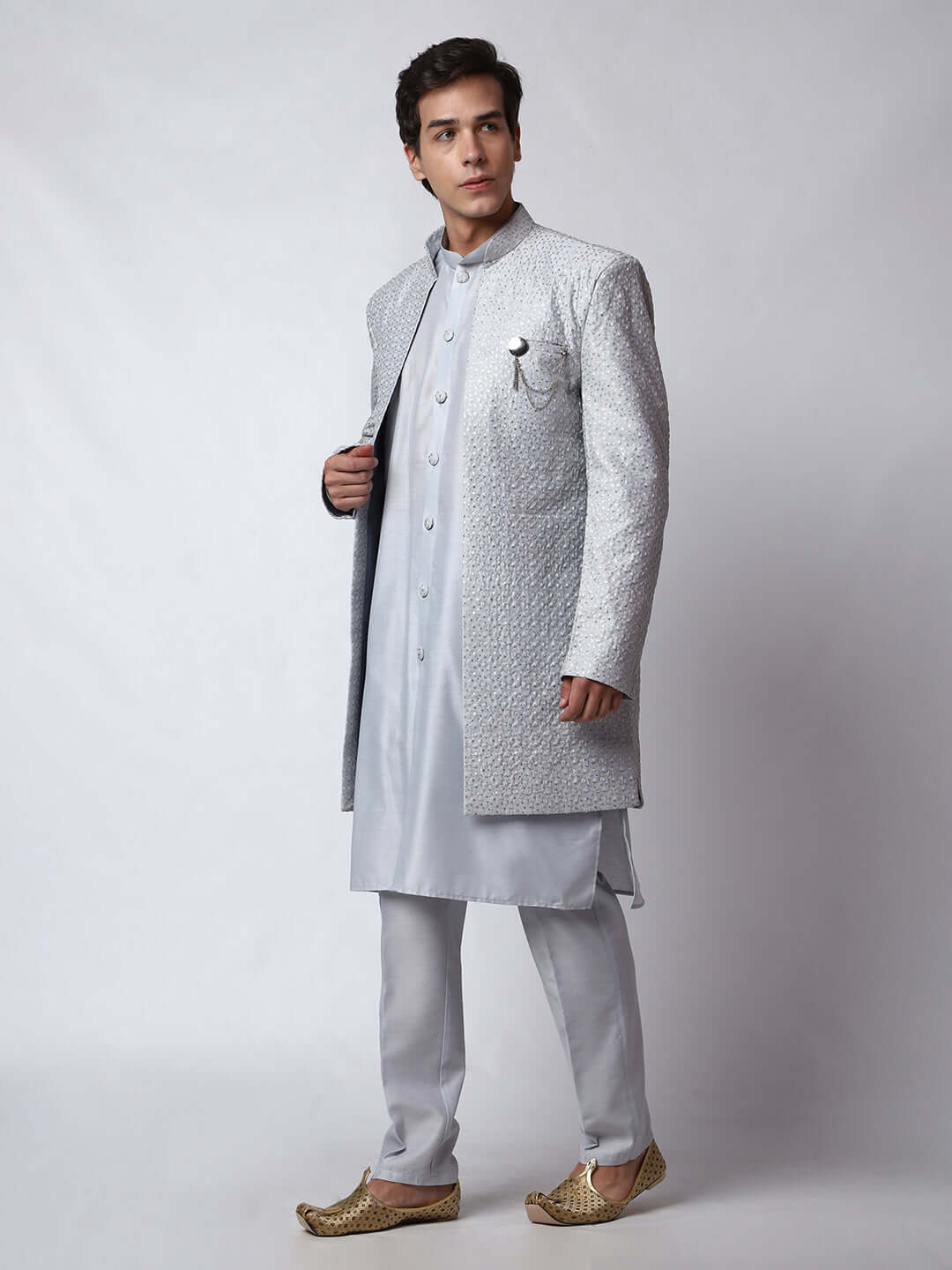 Pearl Indo Western Dress for men which is made up of cotton silk with heavy embroidery, perfect for Indian weddings. Shop this mens indo western dress from Crease India website.