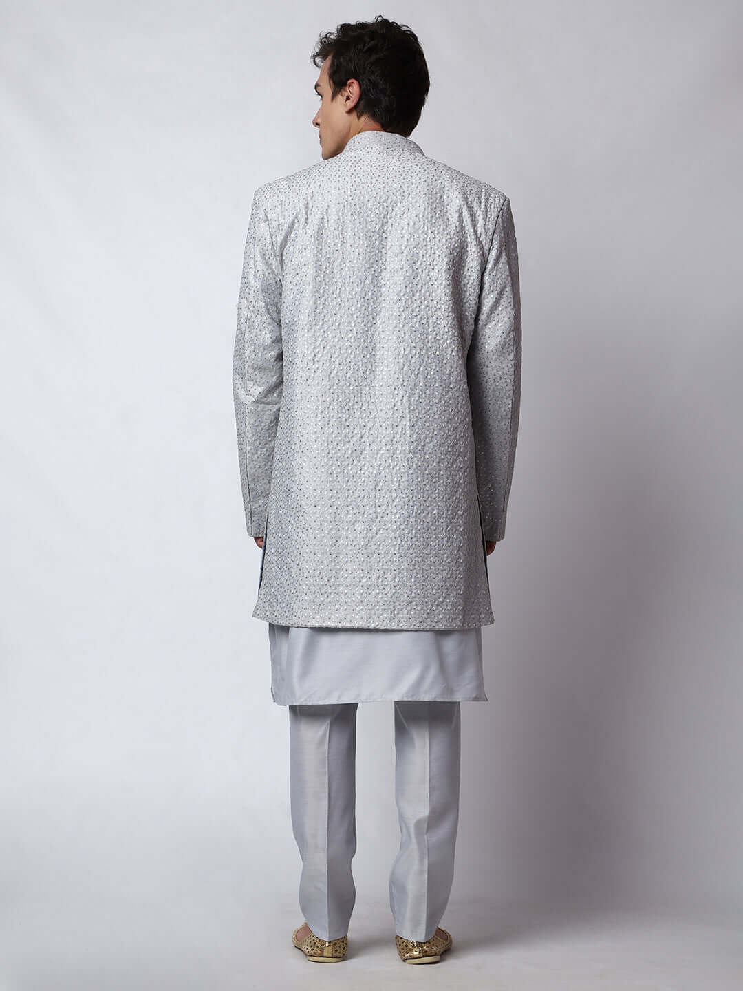 Pearl Indo Western Dress for men which is made up of cotton silk with heavy embroidery, perfect for Indian weddings. Shop this mens indo western dress from Crease India website.