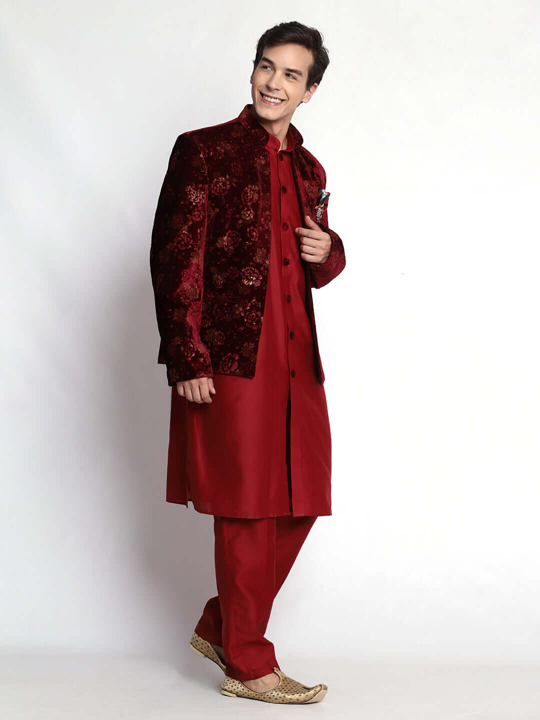 Red Indo Western Dress for men which is made up of velvet and cotton silk with embossed pattern design, perfect for Indian weddings. Shop this mens indo western dress from Crease India website.