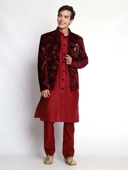 Red Indo Western Dress for men which is made up of velvet and cotton silk with embossed pattern design, perfect for Indian weddings. Shop this mens indo western dress from Crease India website.