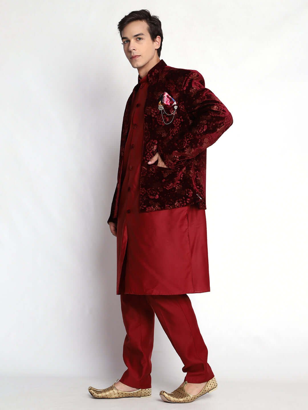 Red Indo Western Dress for men which is made up of velvet and cotton silk with embossed pattern design, perfect for Indian weddings. Shop this mens indo western dress from Crease India website.