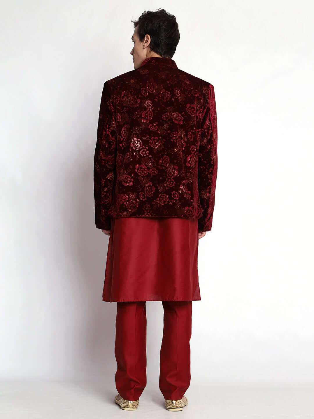 Red Indo Western Dress for men which is made up of velvet and cotton silk with embossed pattern design, perfect for Indian weddings. Shop this mens indo western dress from Crease India website.