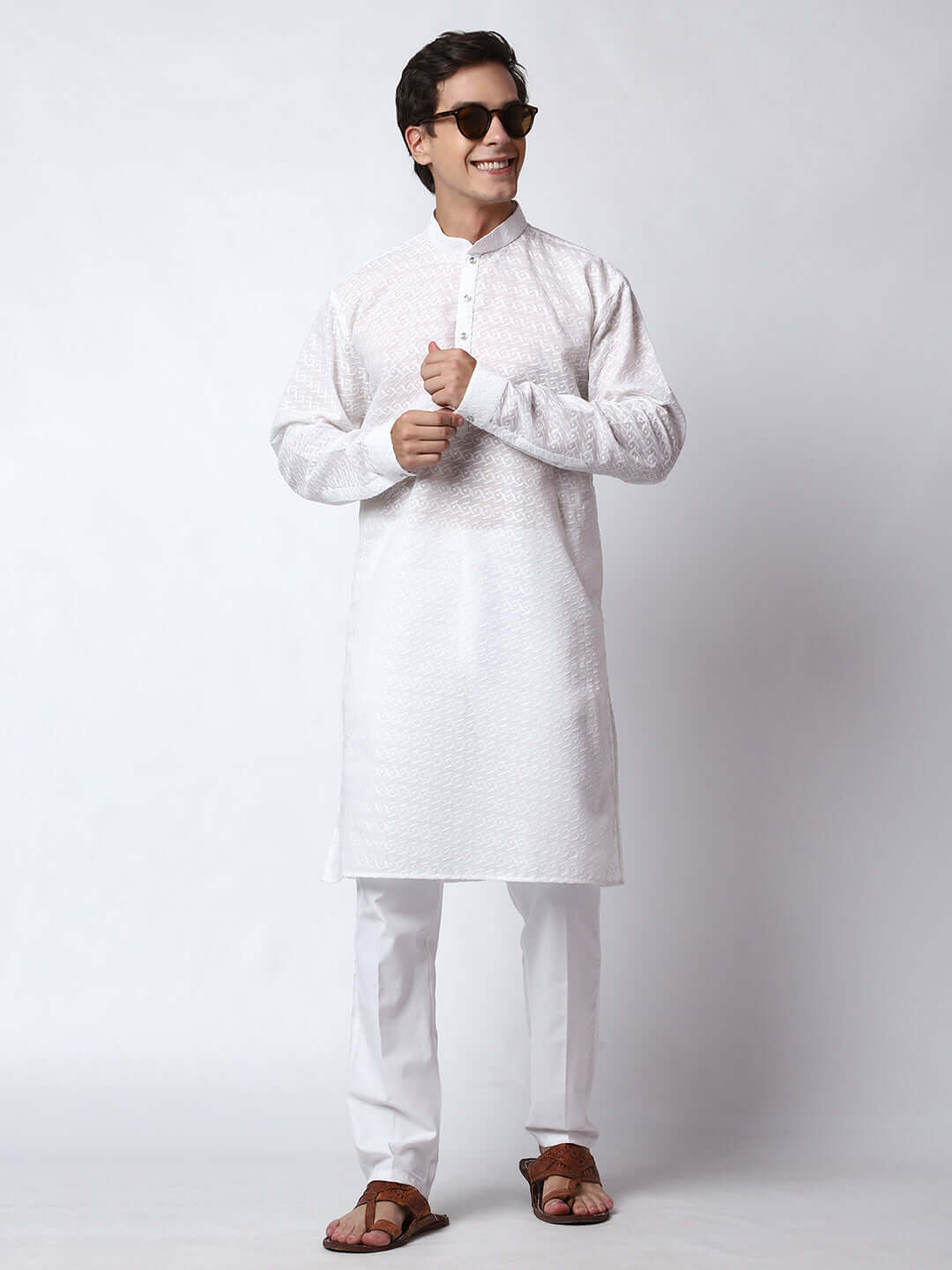 White Chikankari Kurta for Men, perfect for Indian wedding functions, festivals, casual outings, office ethnic day wear, and other occasions. Shop this chikankari kurta for male on Crease India Website.