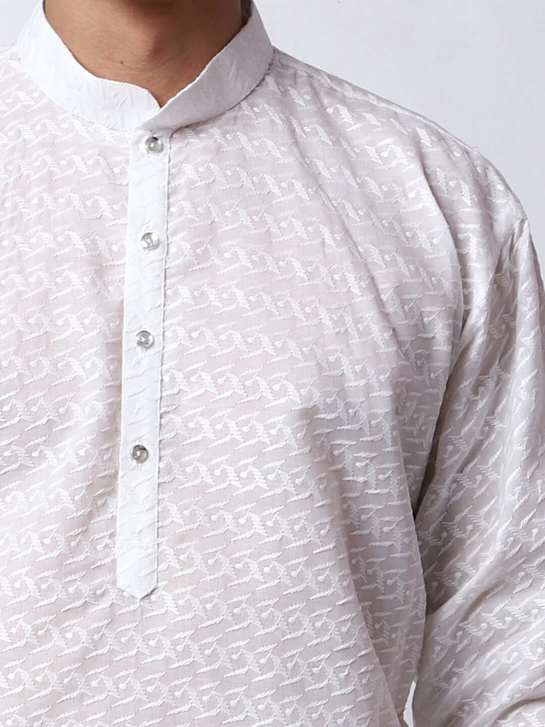 White Chikankari Kurta for Men, perfect for Indian wedding functions, festivals, casual outings, office ethnic day wear, and other occasions. Shop this chikankari kurta for male on Crease India Website.