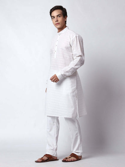 White Chikankari Kurta for Men, perfect for Indian wedding functions, festivals, casual outings, office ethnic day wear, and other occasions. Shop this chikankari kurta for male on Crease India Website.