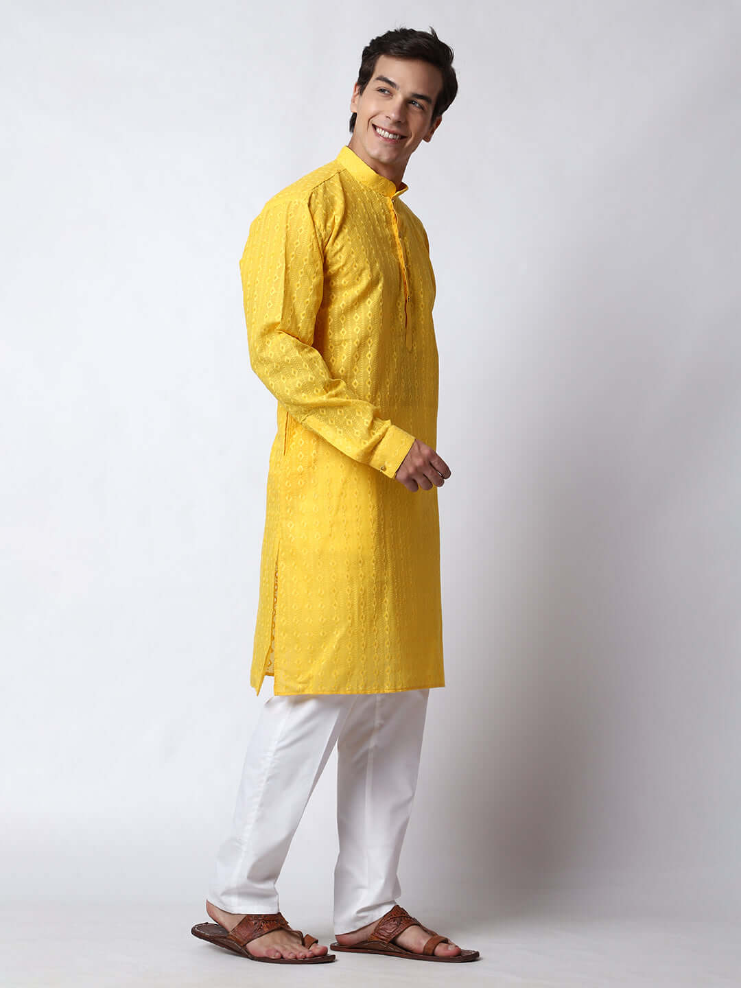 Yellow Chikankari Kurta for Men, perfect for Indian wedding haldi functions, festivals, casual outings, office ethnic day wear, and other occasions. Shop this chikankari kurta for male on Crease India Website.