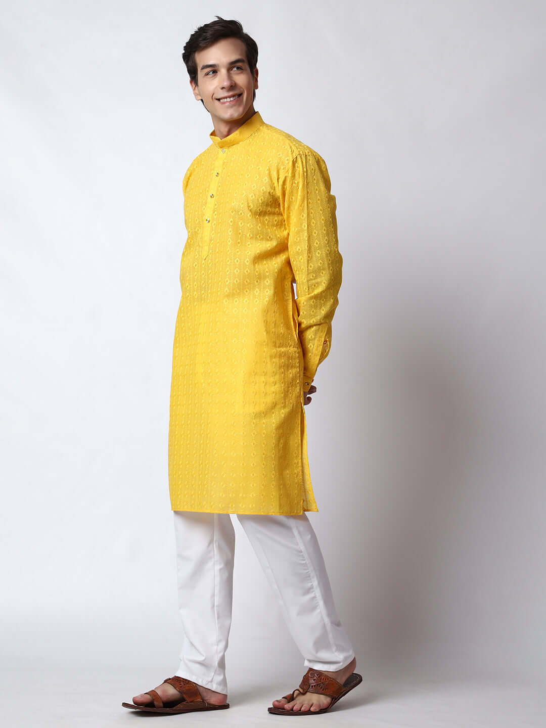 Yellow Chikankari Kurta for Men, perfect for Indian wedding haldi functions, festivals, casual outings, office ethnic day wear, and other occasions. Shop this chikankari kurta for male on Crease India Website.