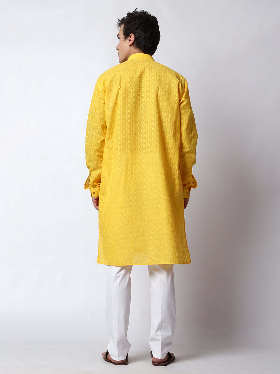 Yellow Chikankari Kurta for Men, perfect for Indian wedding haldi functions, festivals, casual outings, office ethnic day wear, and other occasions. Shop this chikankari kurta for male on Crease India Website.