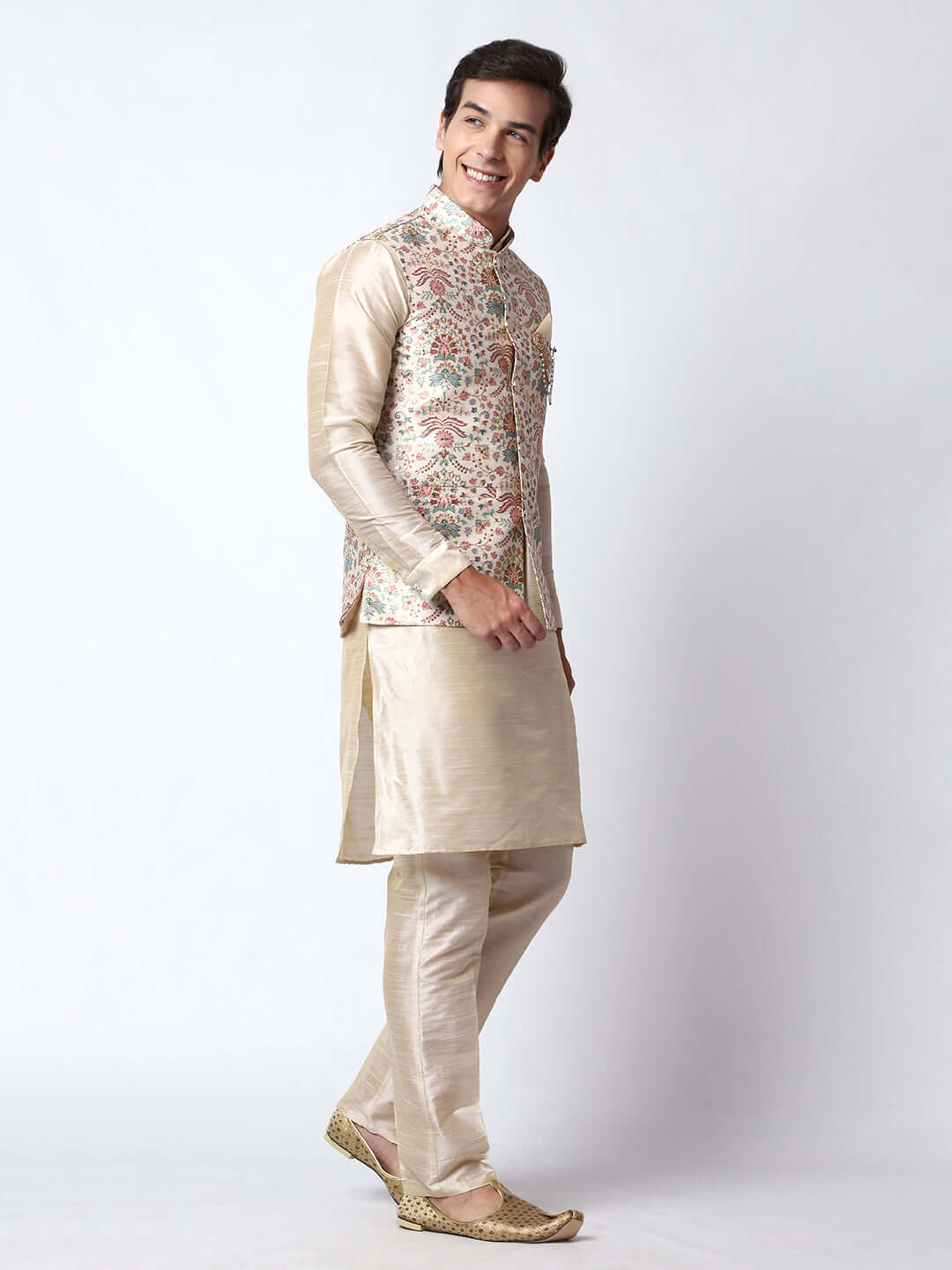 Zari Cream Kurta Pant with Jacket for men available online in India. A sophisticated men's ethnic wear ensemble featuring a cream dupion silk kurta jacket set. The jacket has prints and zari embroidery detailing. This designer cream kurta jacket set for men is ideal for weddings, Diwali, Eid, Navratri, & more festivals. Shop this designer cream kurta set for men on Crease India Website.