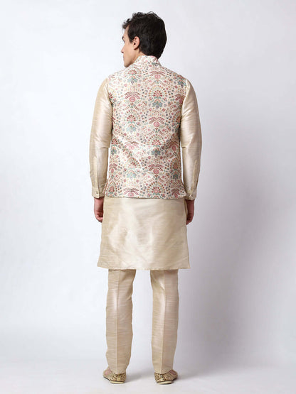 Zari Cream Kurta Pant with Jacket for men available online in India. A sophisticated men's ethnic wear ensemble featuring a cream dupion silk kurta jacket set. The jacket has prints and zari embroidery detailing. This designer cream kurta jacket set for men is ideal for weddings, Diwali, Eid, Navratri, & more festivals. Shop this designer cream kurta set for men on Crease India Website.